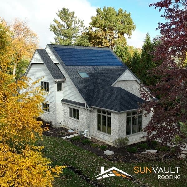 Display ad for Sun Vault Roofing; image of house with solar shingles