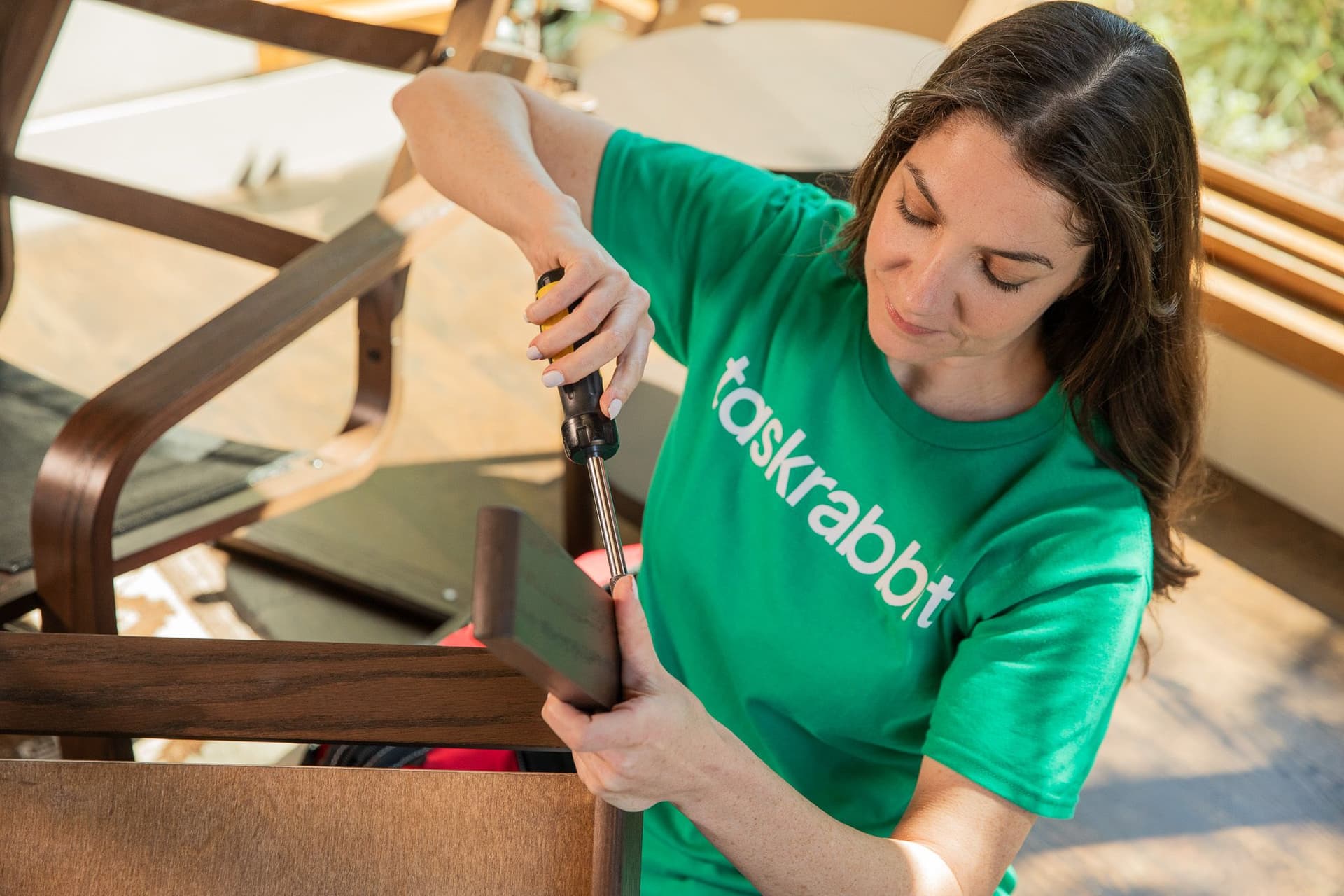 Person from Taskrabbit putting together furniture
